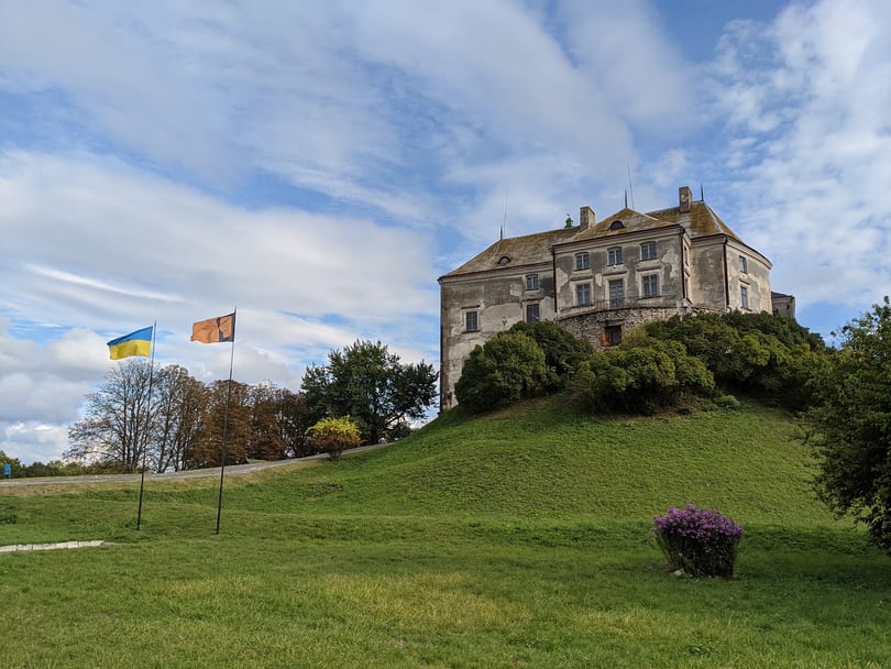 Olesko Castle on its hill above the surrounding farmland